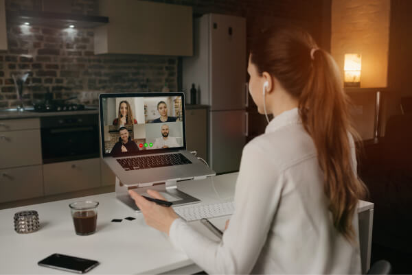 back-view-female-employee-working-remotely-talking-her-colleagues-about-business-video-conference-desktop-computer-home-multiethnic-business-team-online-meeting 1 (2) (1)