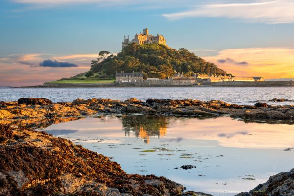 Penzance, Cornwall, United Kingdom - August 9, 2016: View of St Michael's Mount in Cornwall at sunset