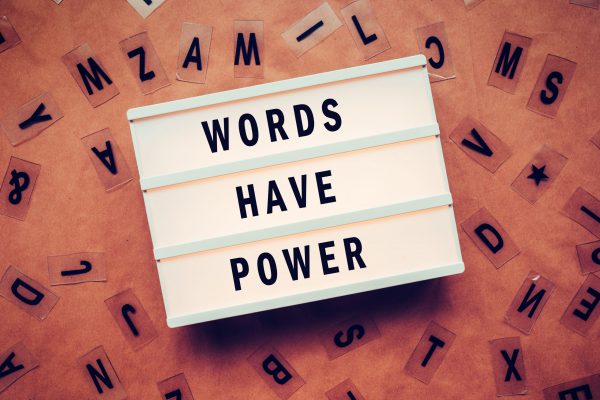 Words have power concept with letters and lightbox
